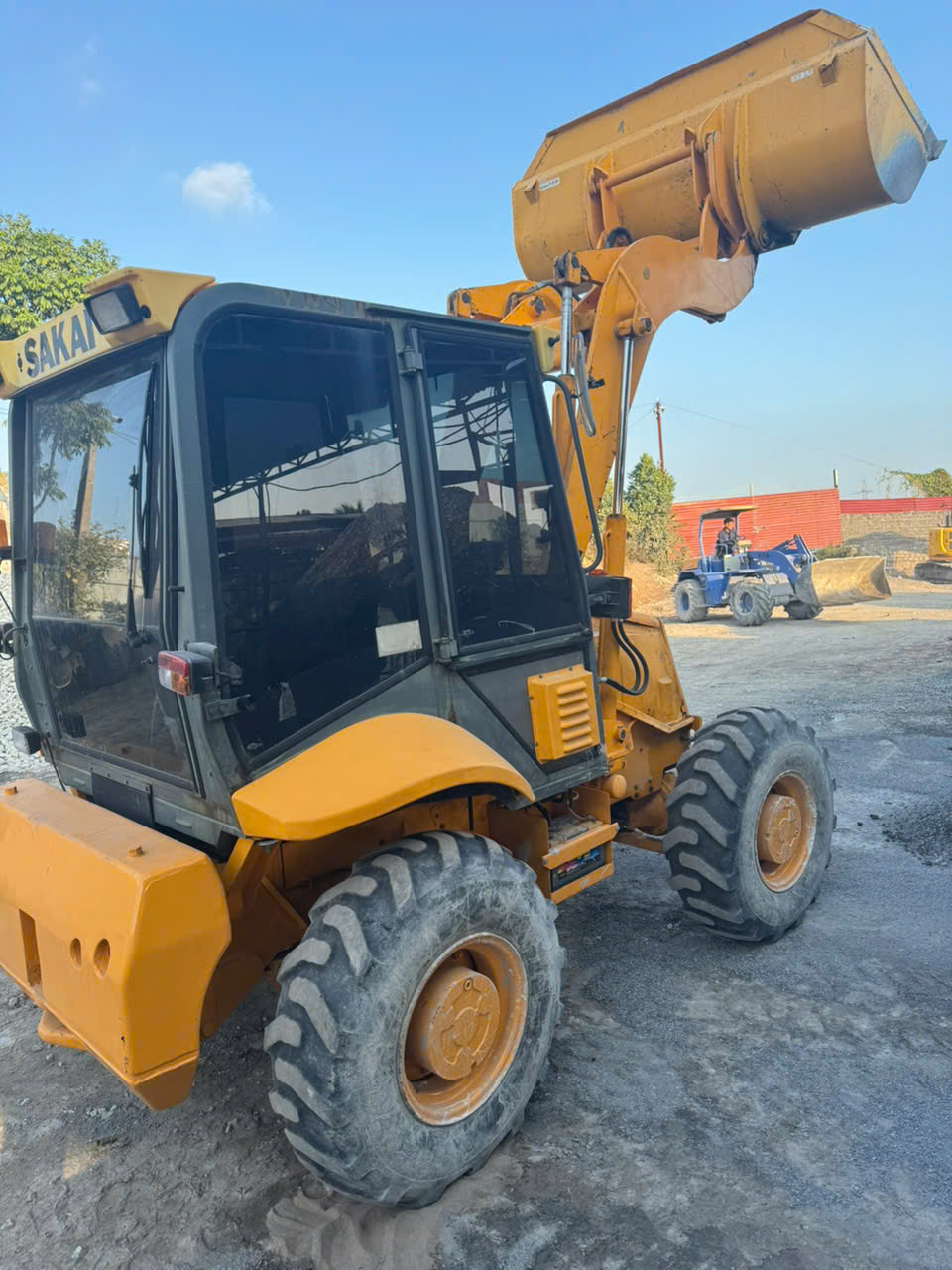 ban xuc lat  gau xuc 0.8m3 co thao lap nhanh thuy luc co cang nang dieu hoa day du